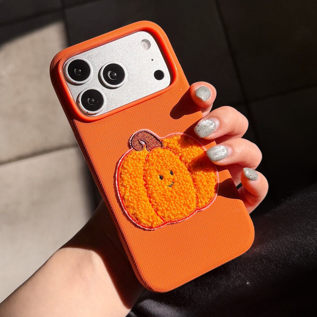 Orange Fabric Phone Case with Plush Embroidered Pumpkin & Pom-Pom Bell Wrist Strap