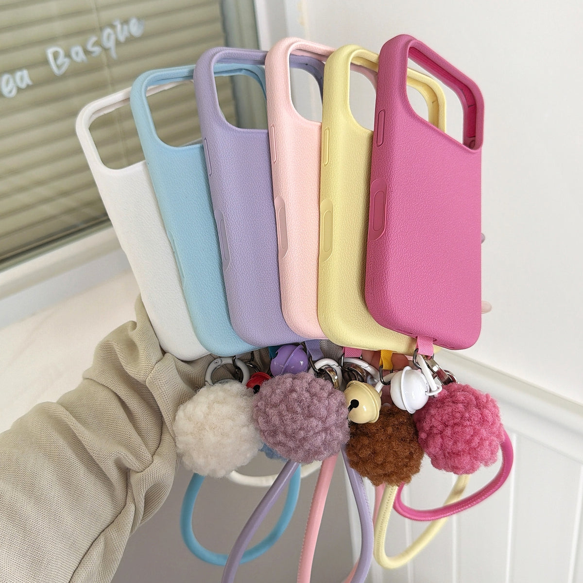 Solid Color Bell Wrist Strap Phone Case