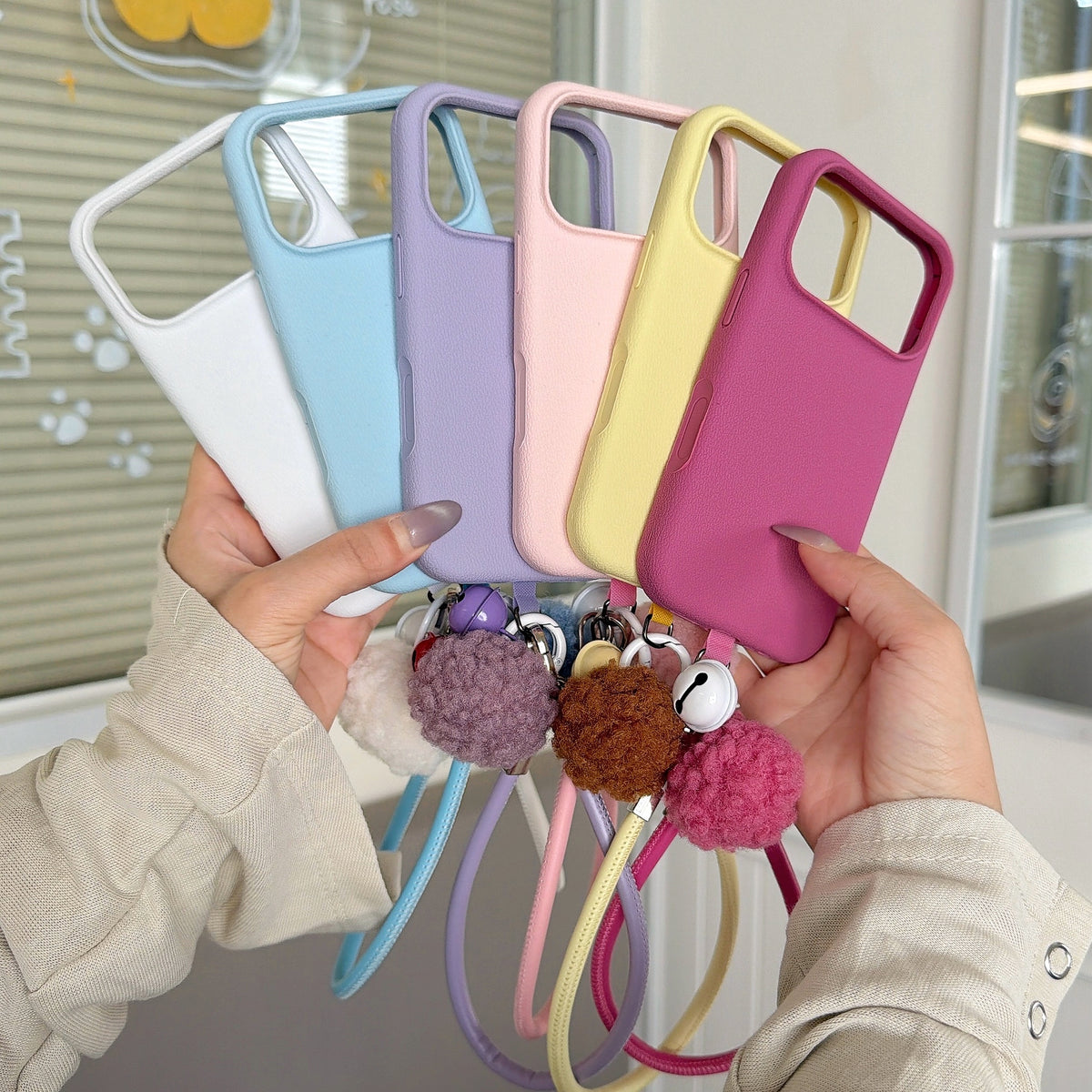 Solid Color Bell Wrist Strap Phone Case